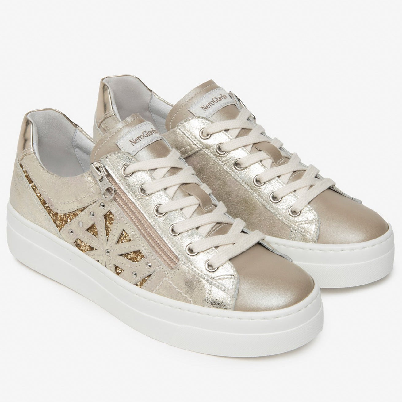 Sneakers NeroGiardini woman gold leather glitter inserts with zip
