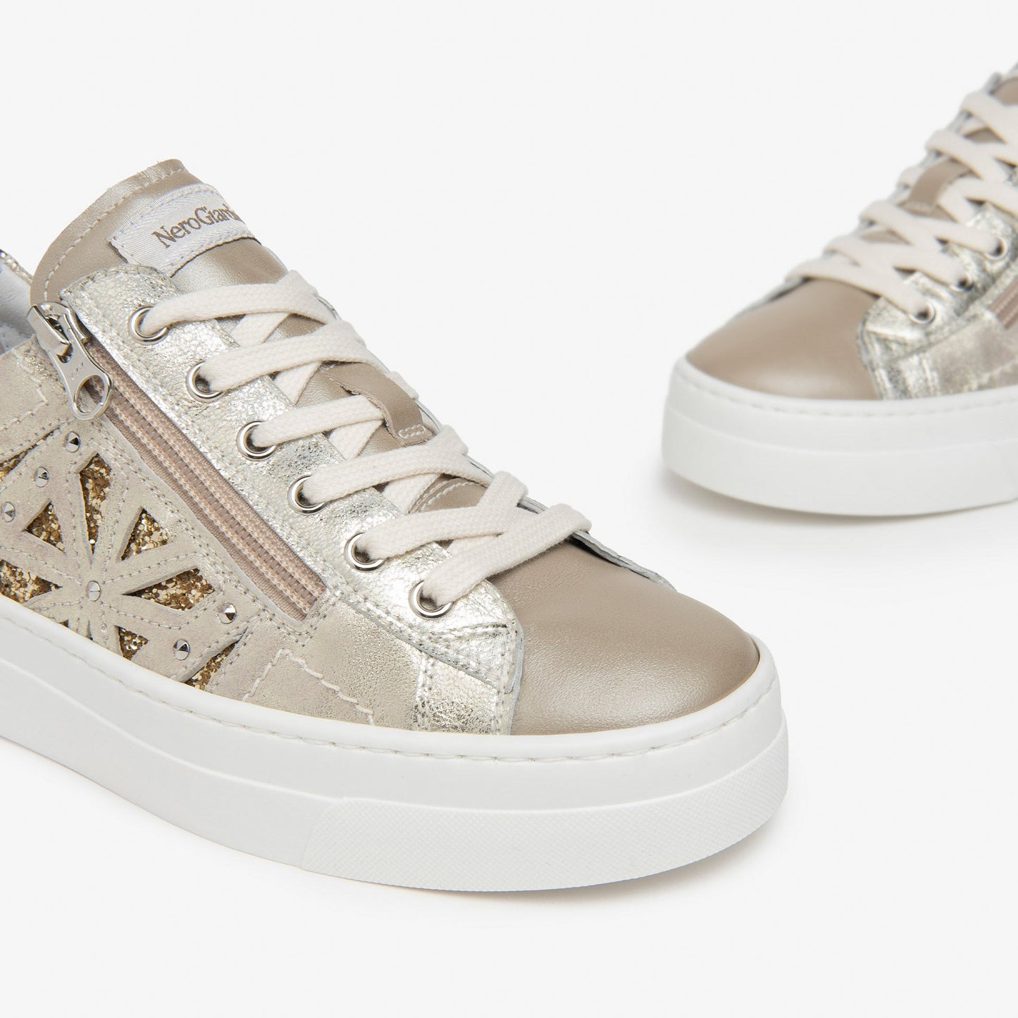 Sneakers NeroGiardini donna pelle oro inserti glitter con zip